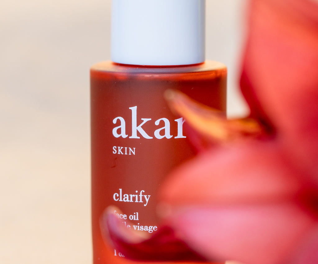 Akar Skin, Clarify Face Oil, skincare product, red, bottle, flower, photography, lifestyle, clean beauty
